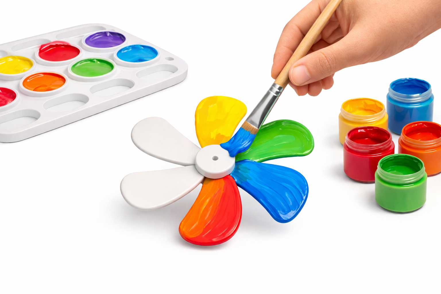 Hand painting a SwapAFan propeller with bright paints and a palette